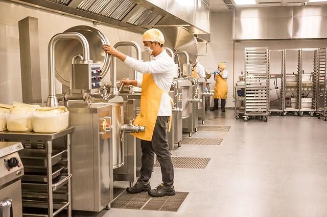 Food production facility with stainless steel processing equipment